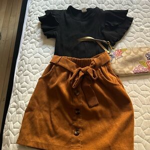 Super cute little girls, shirtand skirt.